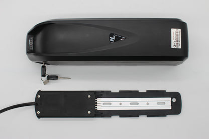 Black electric bike e-bike battery with a key on a light gray background